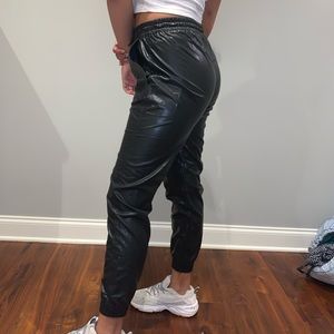 Black faux leather joggers